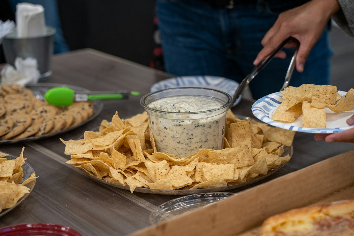 Game day snack spread with chips and dip